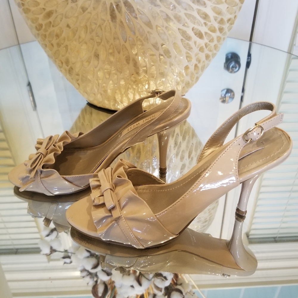 Nude patent leather sling back heels